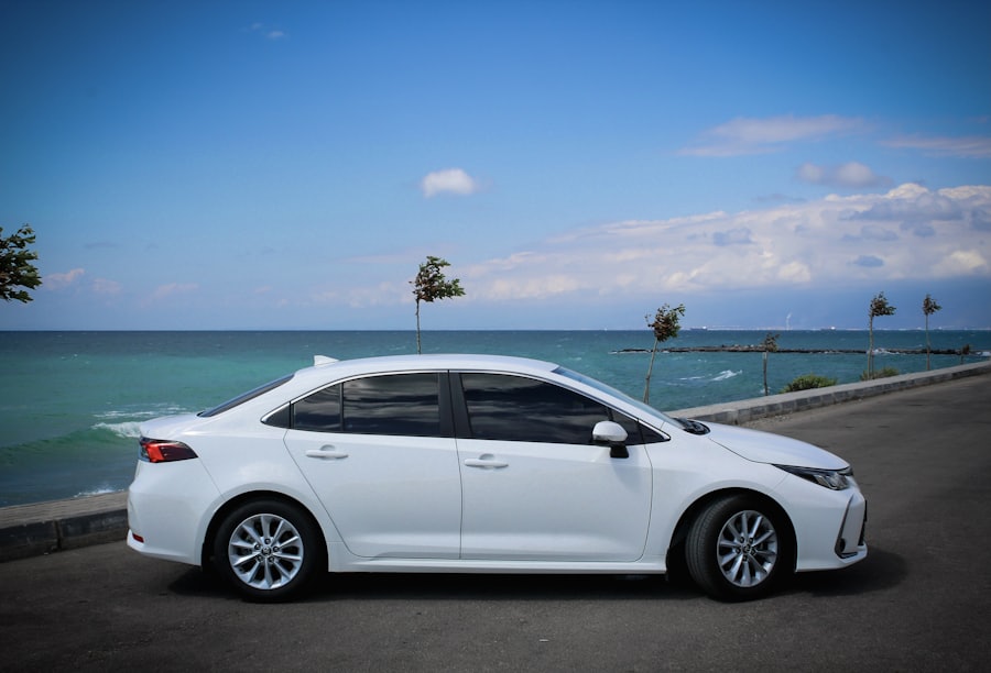 A clean, modern white car used for private shuttle trips